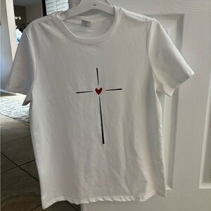 Women’s white cross tee with heart in the middle